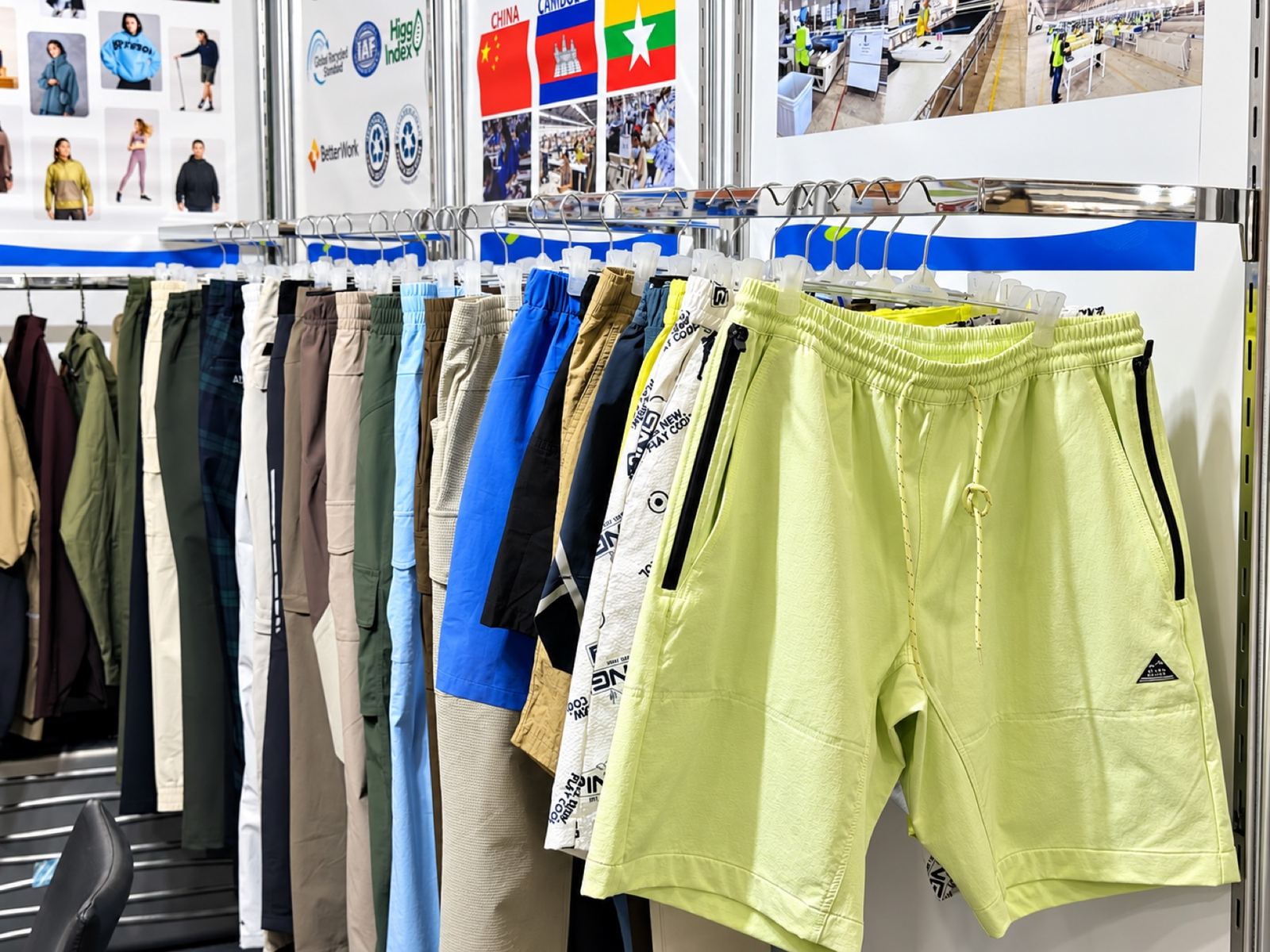 Lime sport shorts on a supplier rack