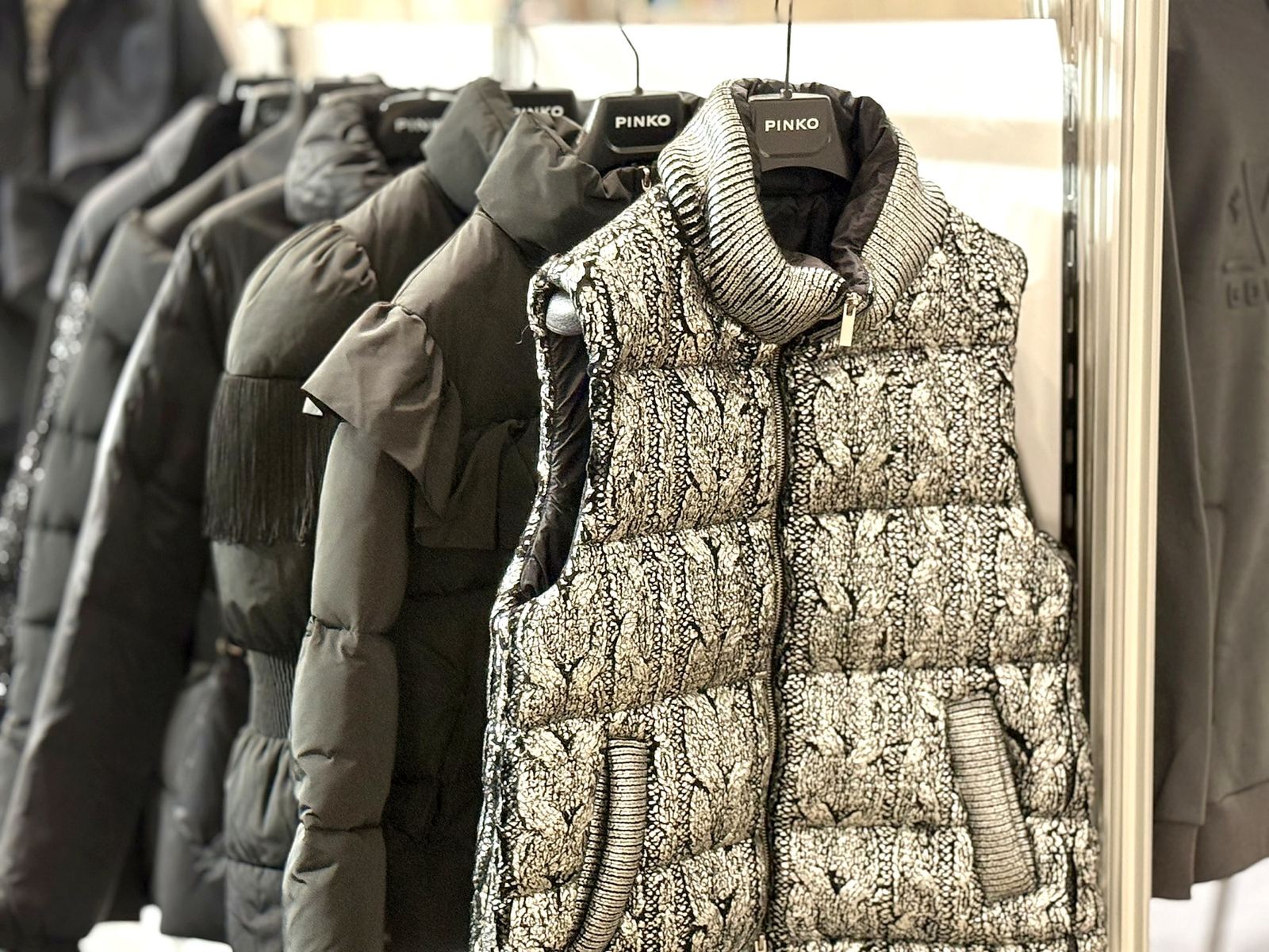 Women's quilted vests and puffer jackets